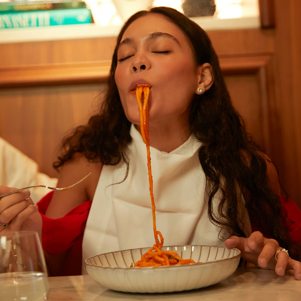 W Hotels Rome Destination Guide Girl Eating Pasta