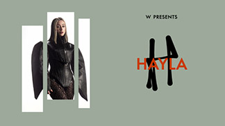 A woman in a dark, futuristic outfit poses between three white vertical bars on a gray-green background. Text reads 