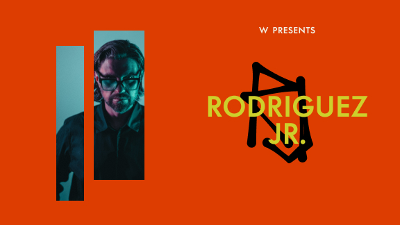 A promotional graphic with an orange background features a photo of a man with glasses on the left and the text 